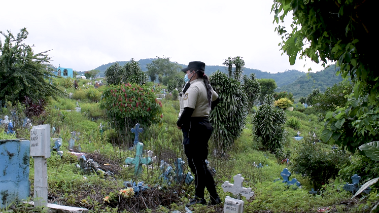 An officer in a territory controlled by gangs in El Salvador