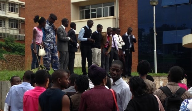 Student leaders including Ivan Bwowe, fifth from the left, Guild President of Makerere University (2014-15) and Lumumba Hall resident (2011-15). They head a student protest against an increase in tuition fees proposed by the Ugandan government.