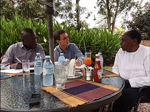 Interview with former Dean of Students George Kihuguru (1970-1995). From left to right, Edwin Mayoki (research team leader), Joan Ricart-Huguet, and former Dean George Kihuguru.