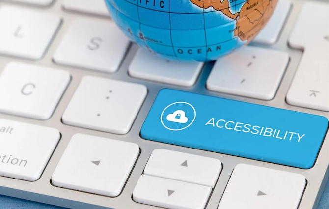 A keyboard with a button titled Accessibility and a partial view of the world globe.