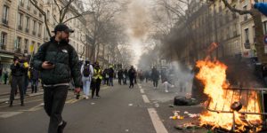 A street fire during protests in Paris against Emmanuel Macron's pension reform.
