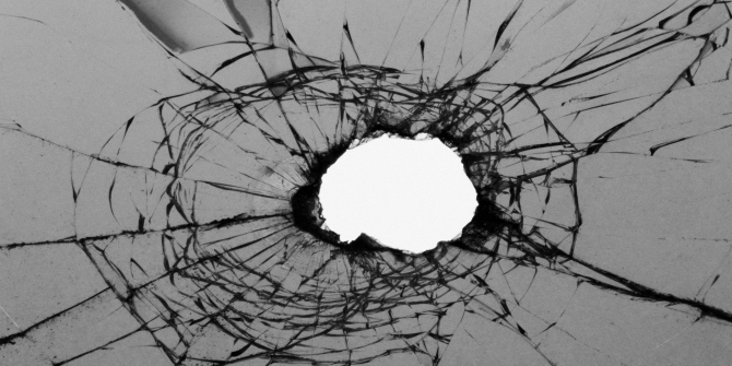 Hole in broken glass