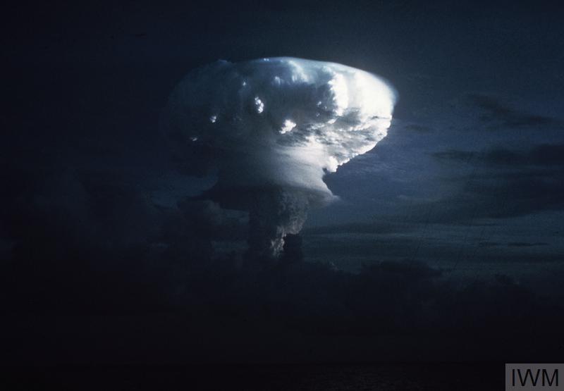 The mushroom cloud of a hydrogen bomb ascends into the sky