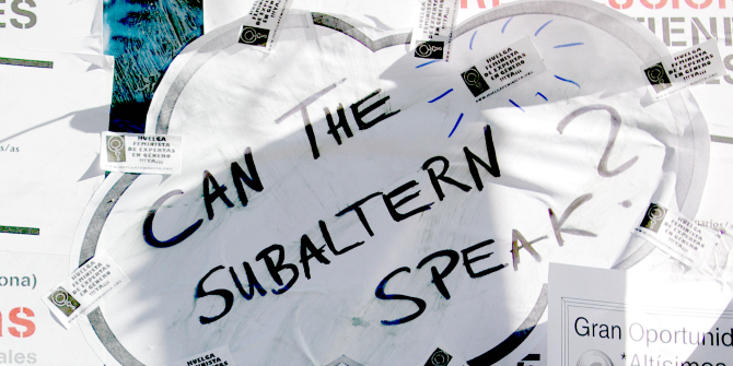 Sign on wall reading 'Can the subaltern speak?'