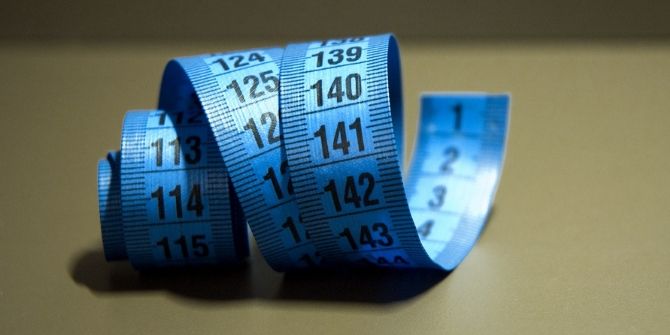 Image of curled-up blue measuring tape
