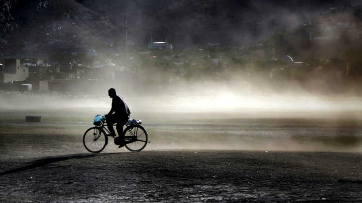 Person on bicycle, Kabul, Afghanistan