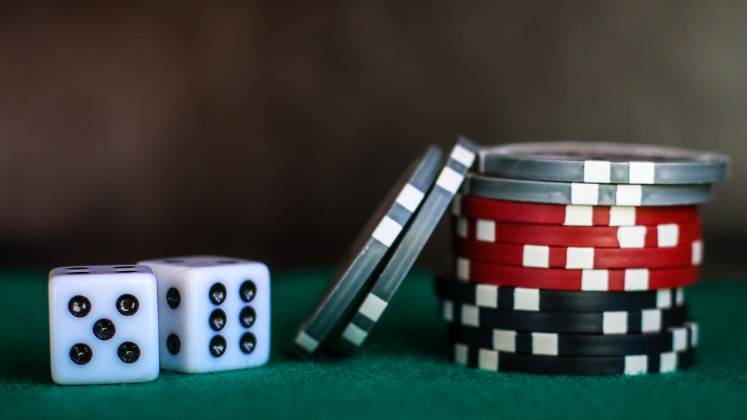 Dice and a stack of poker chips