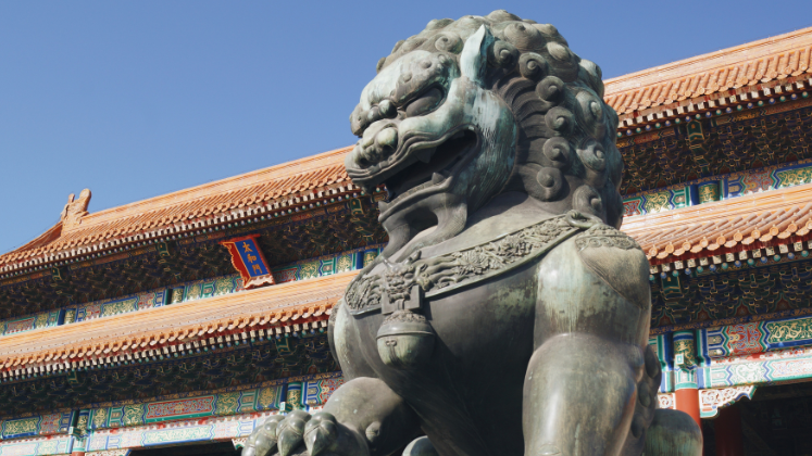 Statue of guardian lion in the Forbidden City, Beijing, China