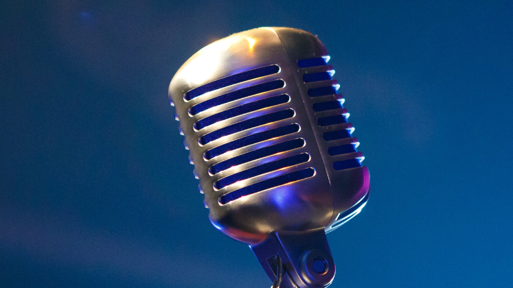 Interview microphone on blue background