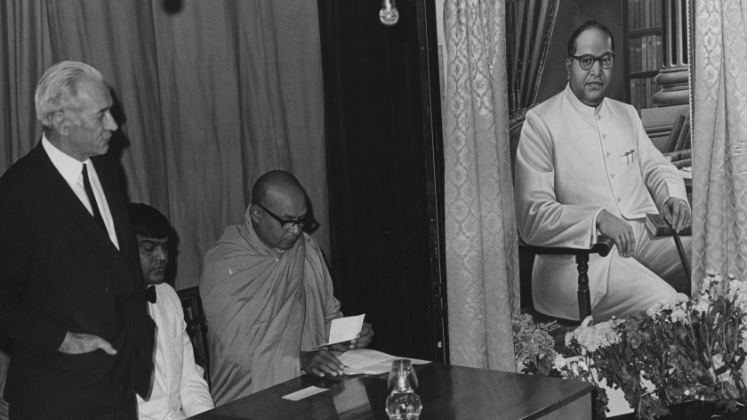 Presentation of portrait of Dr B.R. Ambedkar by the Dr Ambedkar Memorial Committee, Great Britain, 25 September 1973, featuring (left to right) Sir Walter Adams, Mr D.R. Jassal (Chairman Ambedkar Memorial Committee) and Ven Dr H. Saddatissa (Head of London Buddha Vihara)