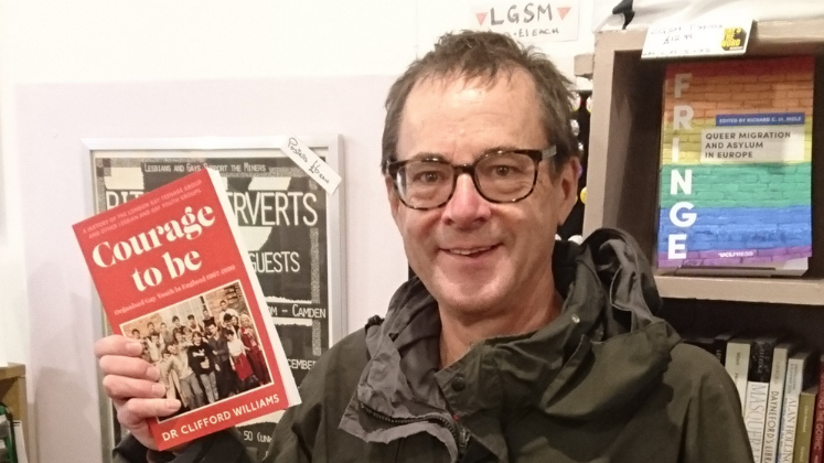 Photograph of author with Courage to Be at Gays' the Word Bookshop