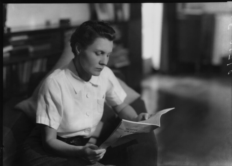 Photograph of Edith Summerskill reading paper