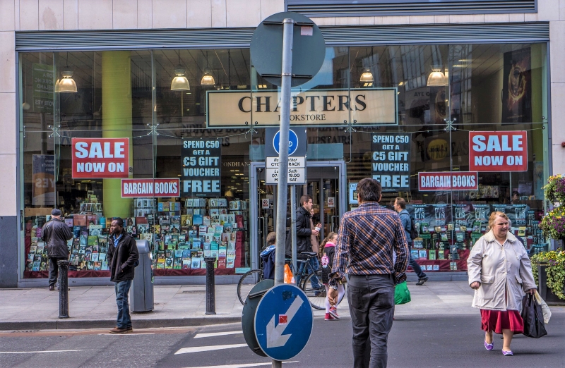 Photograph of Chapters Bookshop Dublin with people on the footpath and crossing the road in front of it.