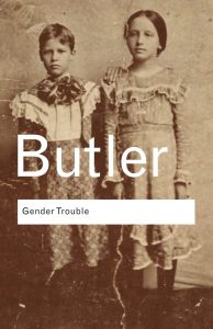 Gender trouble cover showing a sepia toned photo of a boy and girl