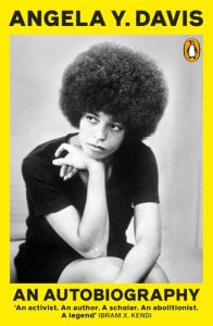 Angela Davis Autobopgrpahy with black and white photo of her and yellow background
