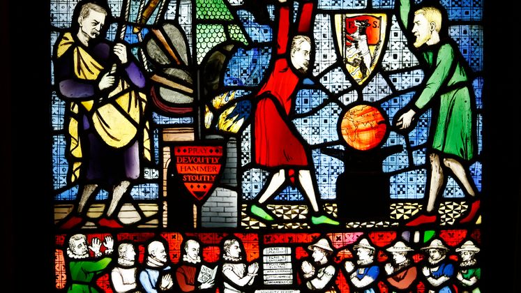 The Fabian Window – Edward Pease is depicted working the bellows. LSE