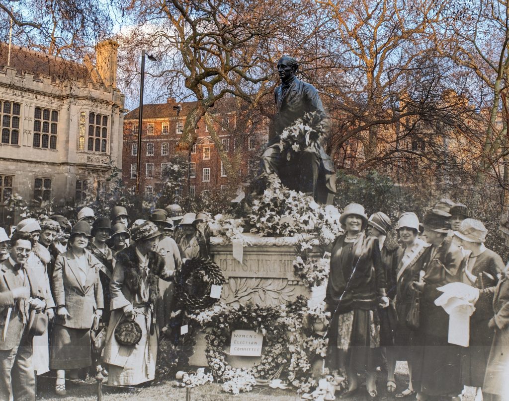 Laying a wreath at the John Stuart Mill statue, Victoria Embankment Gardens, 1927 
