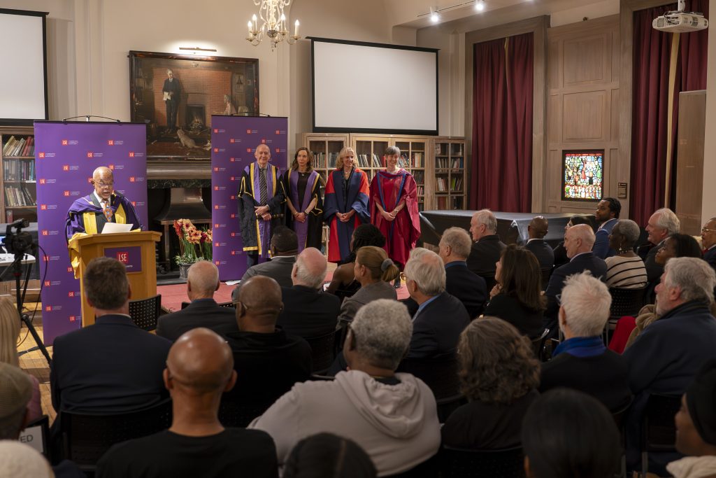 An audience in the Shaw Library watch Professor Henry Louis Gates Jr deliver his LSE honorary award acceptance remarks, 2023. LSE/Noah DaCosta