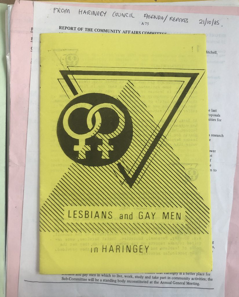A booklet with the title LESBIANS and GAY MEN in HARINGEY. Includes a triangle design and symbols. 